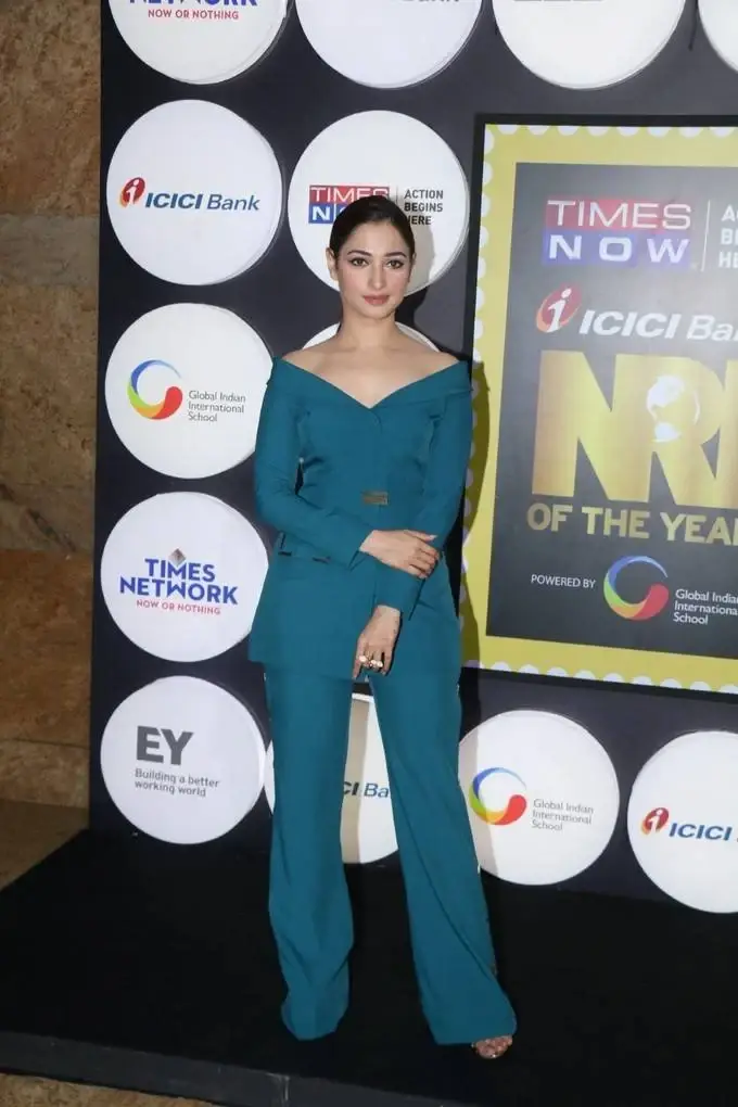 INDIAN MODEL TAMANNA IN GREEN DRESS AT NRI OF THE YEAR AWARDS 3